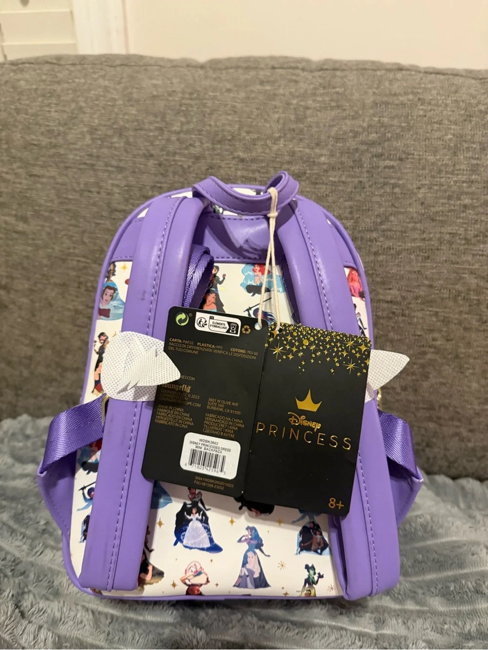 Loungefly White Mini Backpack with Purple Trim and Multicolor Princess Art